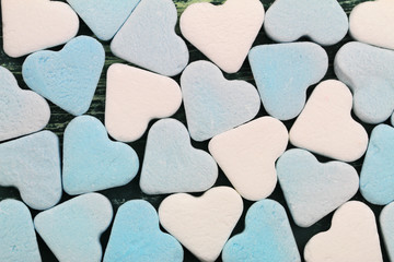 Background made of blue and white sugar hearts
