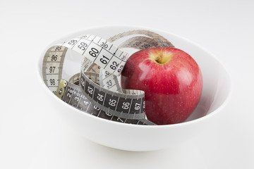 apple and tape measure
