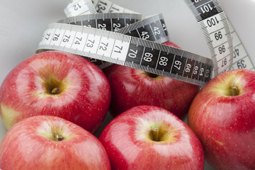 apple and tape measure
