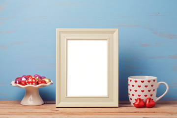 Poster mock up template for Valentine's day with cup and chocolates