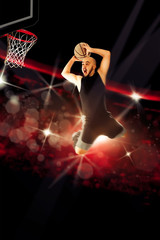 Fototapeta na wymiar professional basketball player makes a slam dunk in the game