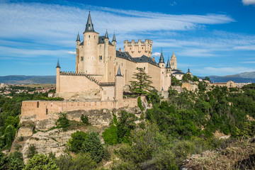 Fototapeta na wymiar Segovia, Spain. The famous Alcazar of Segovia, rising out on a r