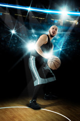 Fototapeta na wymiar Basketball player throws a ball in the game