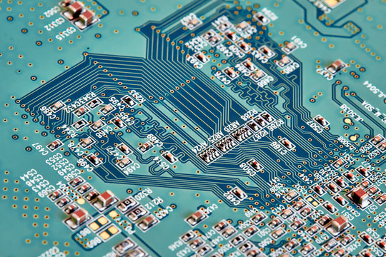 Electronic circuit board close up.