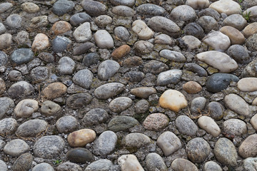 Floor walkway made of small pebbles