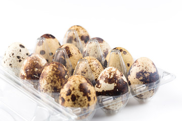 Quail eggs on white