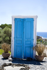 exterior door ajar - blue and white