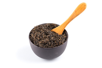 Wild brown rice in spoon