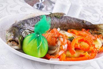 Grilled whole salmon with vegetables