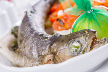 Grilled whole salmon with vegetables