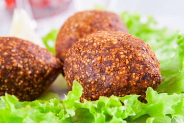 Icli kofta. Turkish dish. Meatballs with bulgur