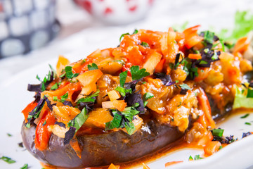 Stuffed eggplant with fried vegetables