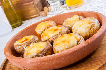 Mushrooms baked with cheese