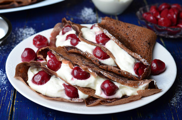 Chocolate Crepes with Cherry and Whipped Cream