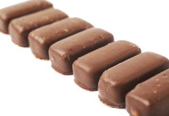 Chocolate coated candy bar isolated