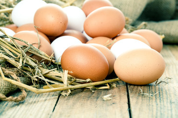 Eggs on wooden background