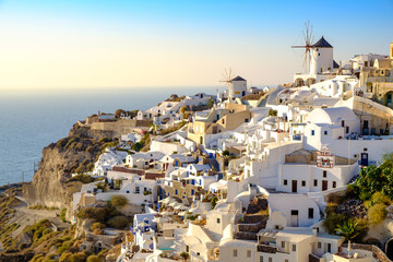 Fototapeta na wymiar View of beautiful village of Oia with whitewashed and colorful h