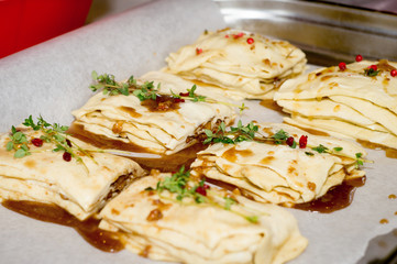 Preparation of baklava, cakes, pastries with honey, raisins and rosemary