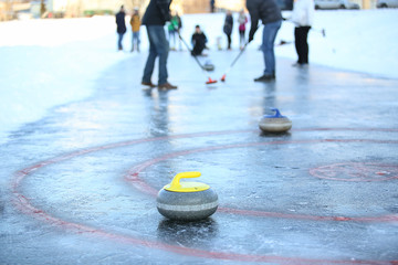 People playing in curling