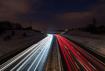 Fototapeta na wymiar highway red and white car light trails