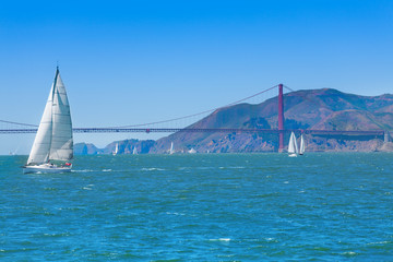 Golden gate bridge and yachts © Sergey Novikov