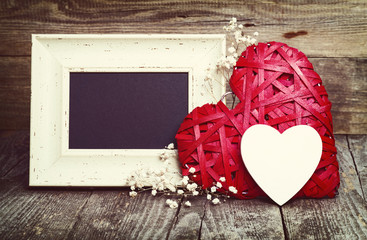 Stylish Blackboard, Small White And Large Red Heart With Dry Flower On Wooden Board. Love Concept In Old Style.