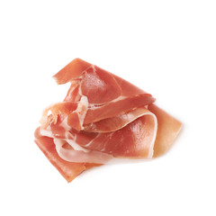 Folded prosciutto ham slice isolated