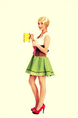 Beautiful bavarian woman with beer.