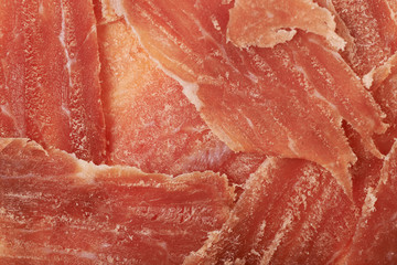 Surface covered with jamon slices