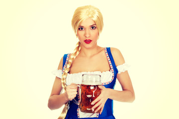 Beautiful bavarian woman with beer.