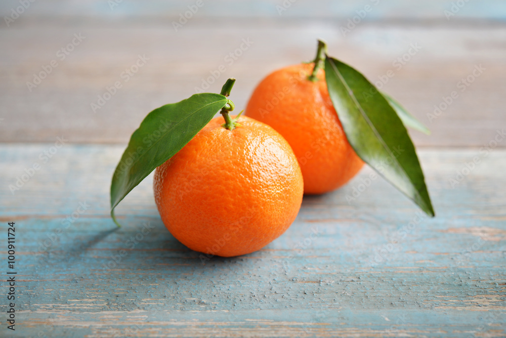 Wall mural tangerines with leaves