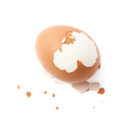 Cracked hard boiled egg isolated