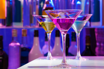 Different cocktail glasses in the bar