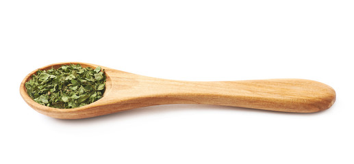 Spoon full of coriander isolated