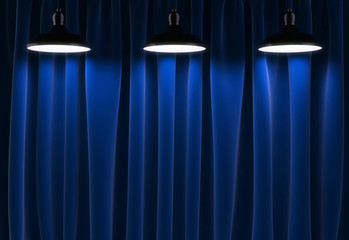 three lamps and blue curtains