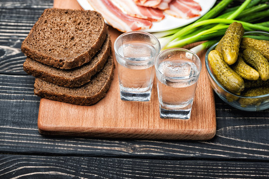 ussian vodka with traditional black bread and pickles
