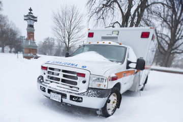 Ambulance covered snow tilt-shift © faustasyan
