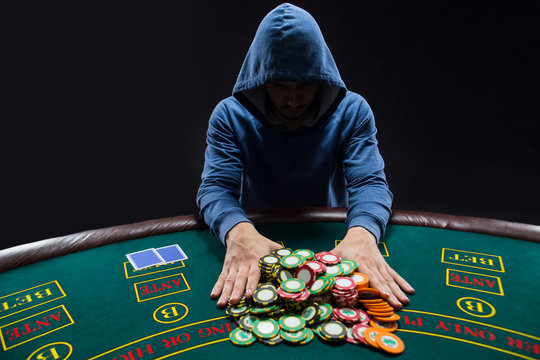censorship Asia Janice Poker player going "all in" pushing his chips forward Stock Photo | Adobe  Stock