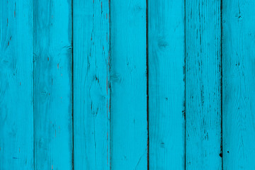 Natural wooden blue boards, wall or fence with knots