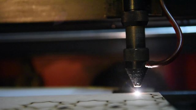 cnc laser  cutting of orient pattern decorative wood, modern industrial technology