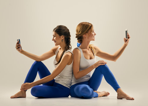 women selfie. yoga in pair