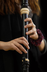 Fototapeta premium Hands girl playing of recorder