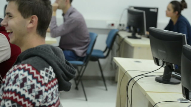 technology students group in computer lab classroom
