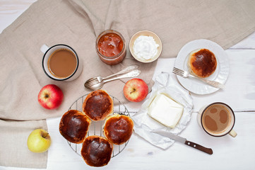 Sweet buns with poppy seeds and apricot jam