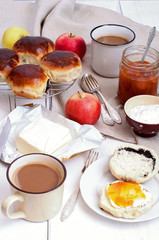 Sweet buns with poppy seeds and apricot jam
