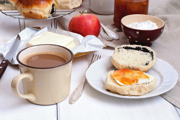 Sweet buns with poppy seeds and apricot jam