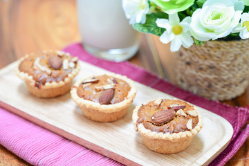 tart with almond nut on top