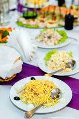 Appetizers and salads at the banquet table