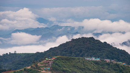 High hill village and clouds