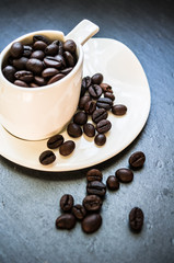 Coffee beans on rustic background